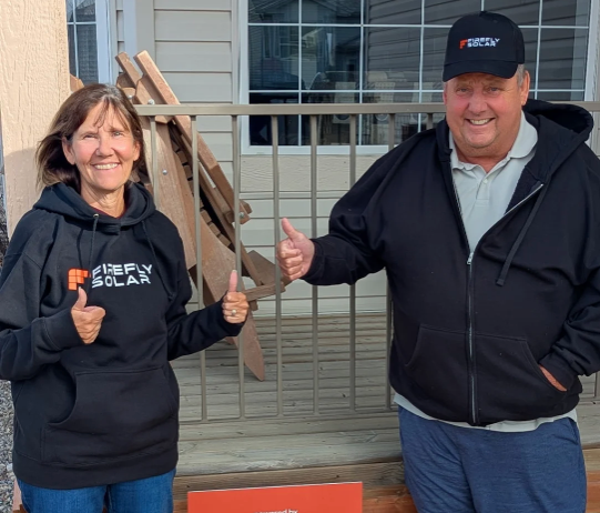 Customer with Firefly Solar representative