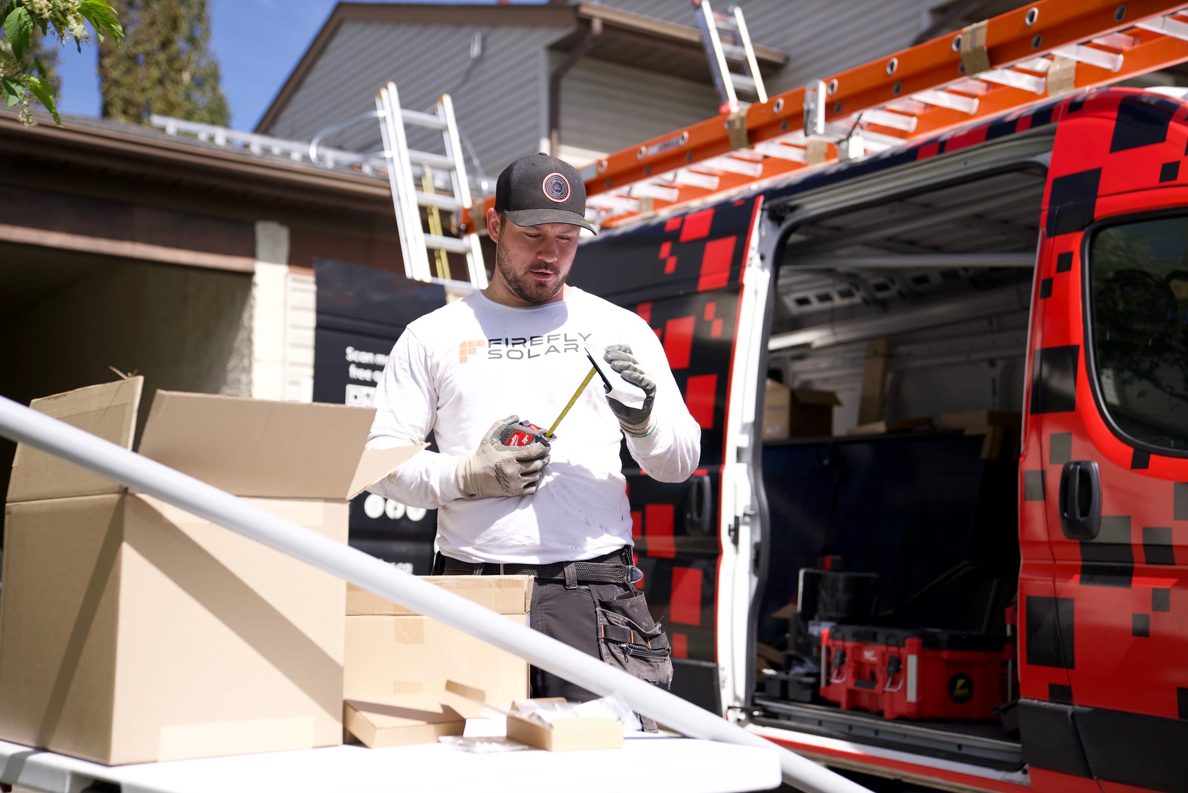 Firefly Solar crew installing panels on a roof